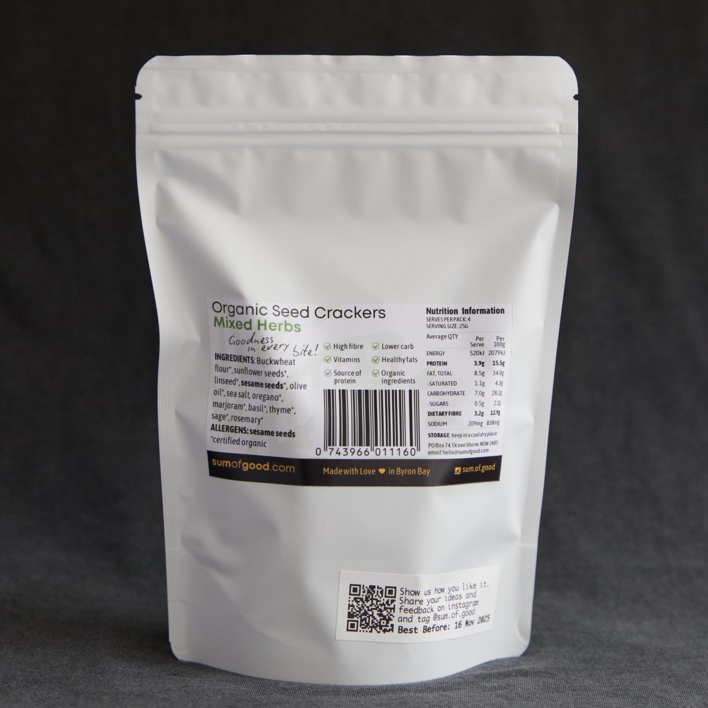 Back view of an organic seed crackers packaging with text and barcode on a dark background