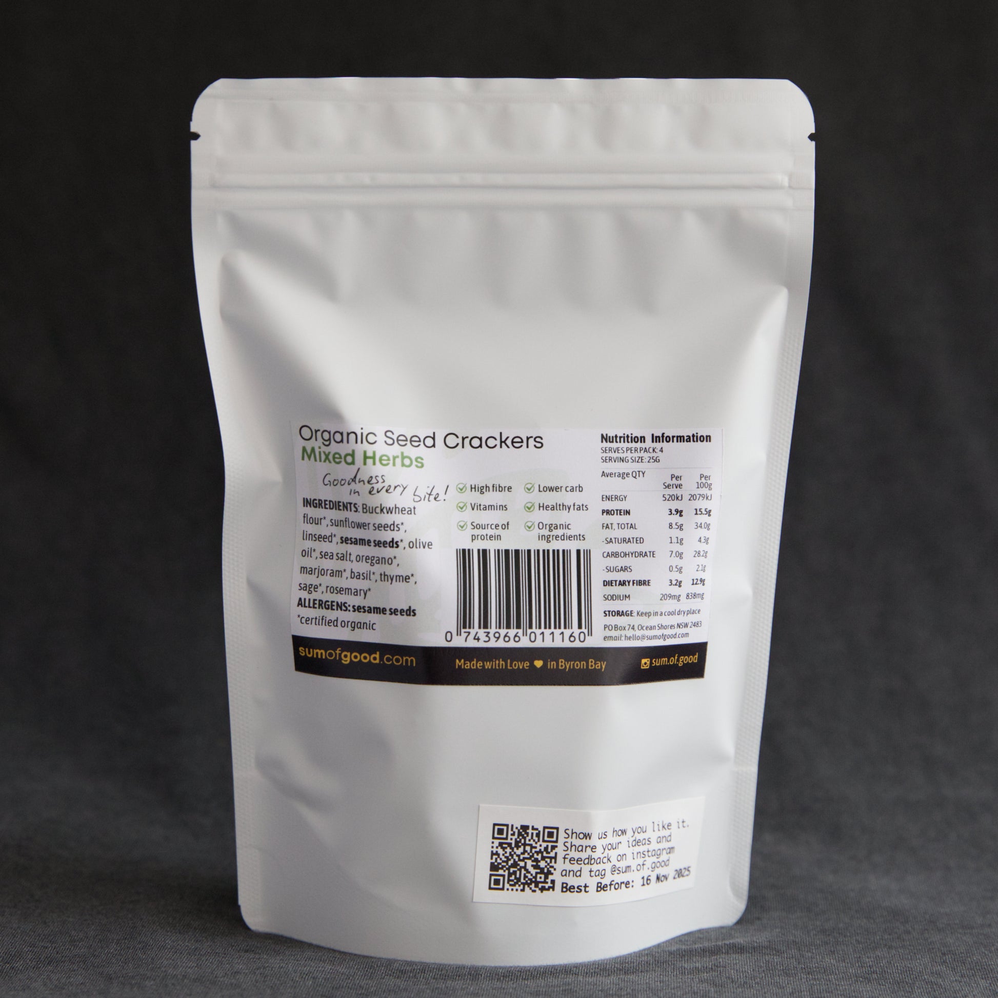 Back view of an organic seed crackers packaging with text and barcode on a dark background